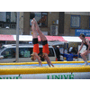Synchroon handstand doorrol
